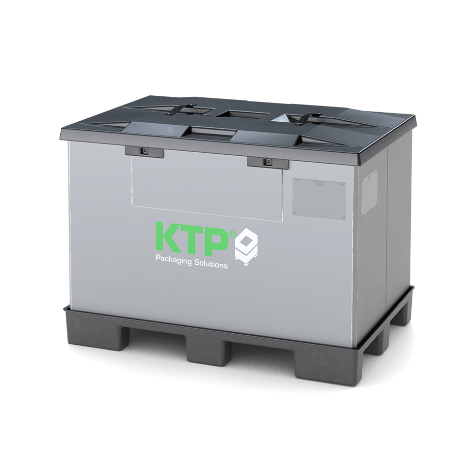 A gray packaging container with a black lid, featuring the logo "KTP Packaging Solutions" in green, resting on a black pallet.