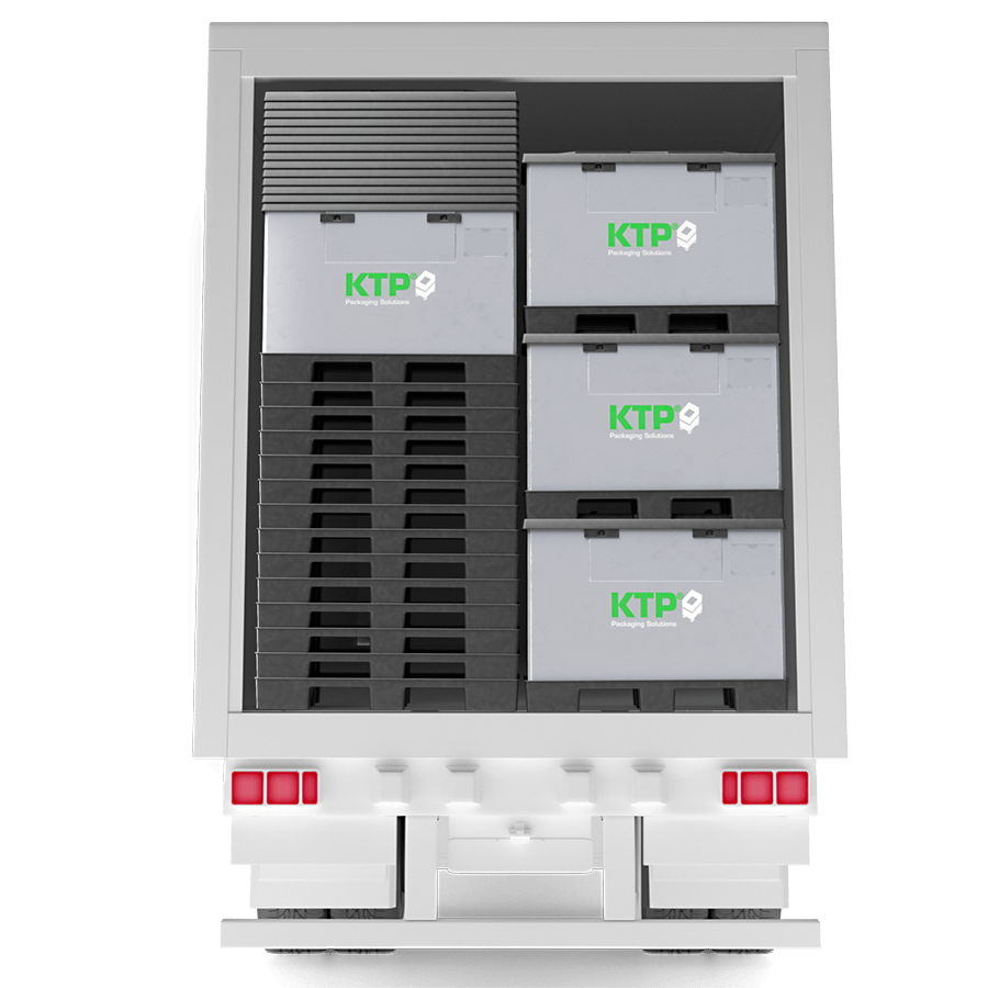 A view of the interior of a delivery truck, showcasing neatly stacked boxes with the logo "KTP Packaging Solutions" printed on them.