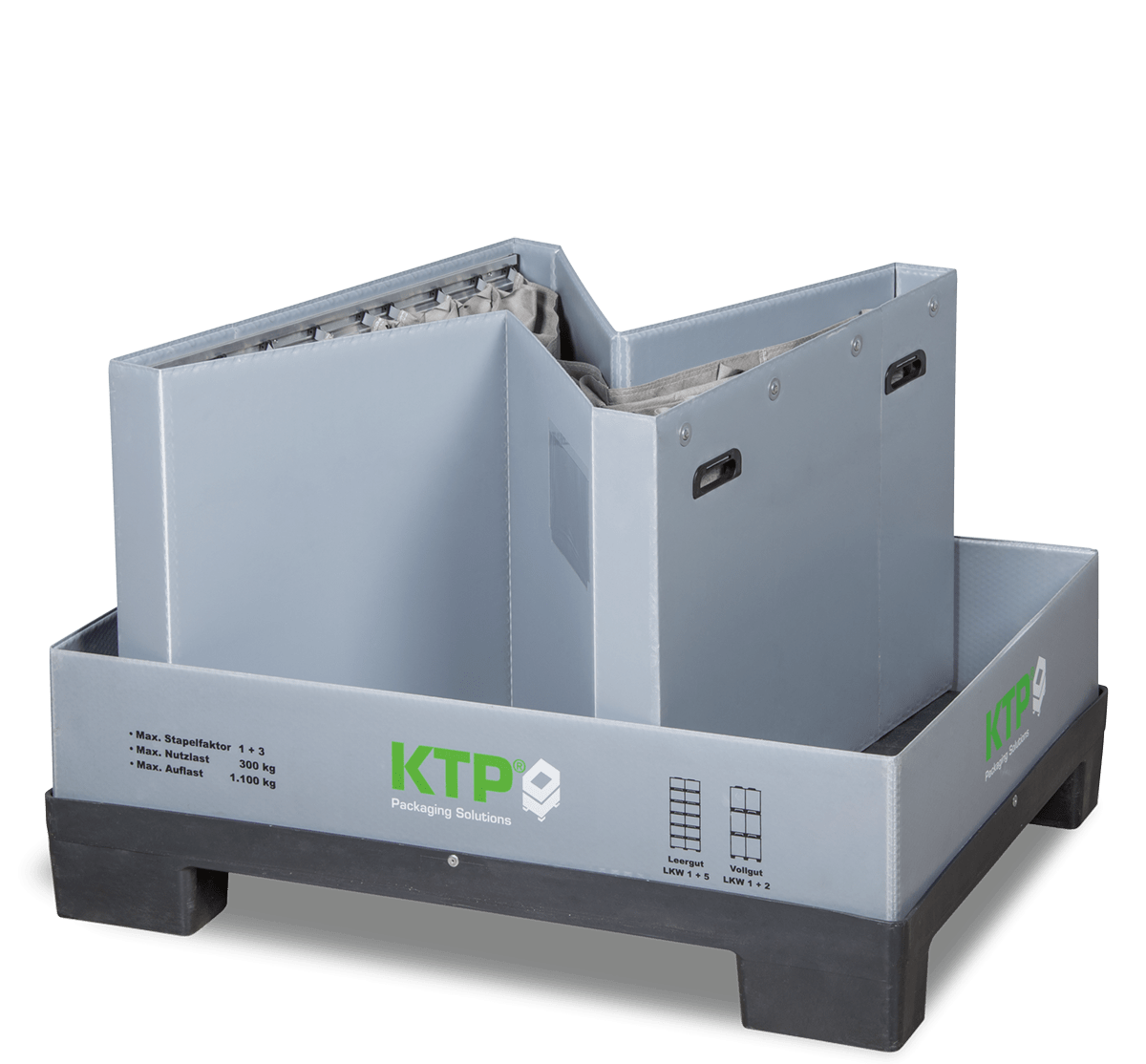 Gray packaging container with two removable compartments on a black pallet, labeled with "KTP Packaging Solutions."