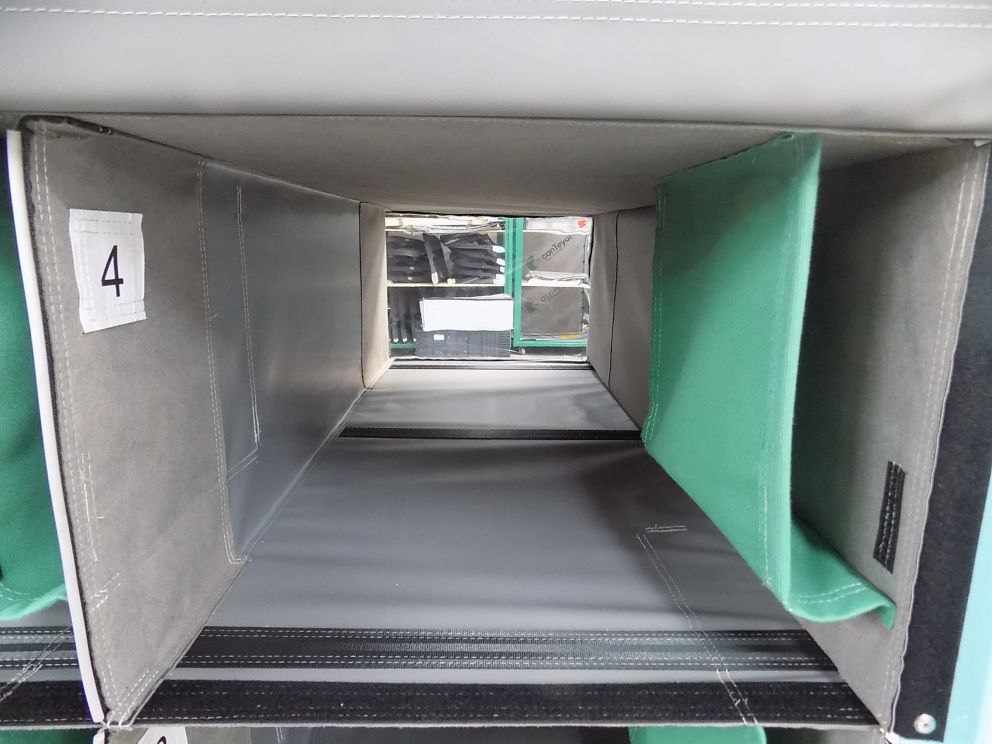 A transport rack with textile inserts