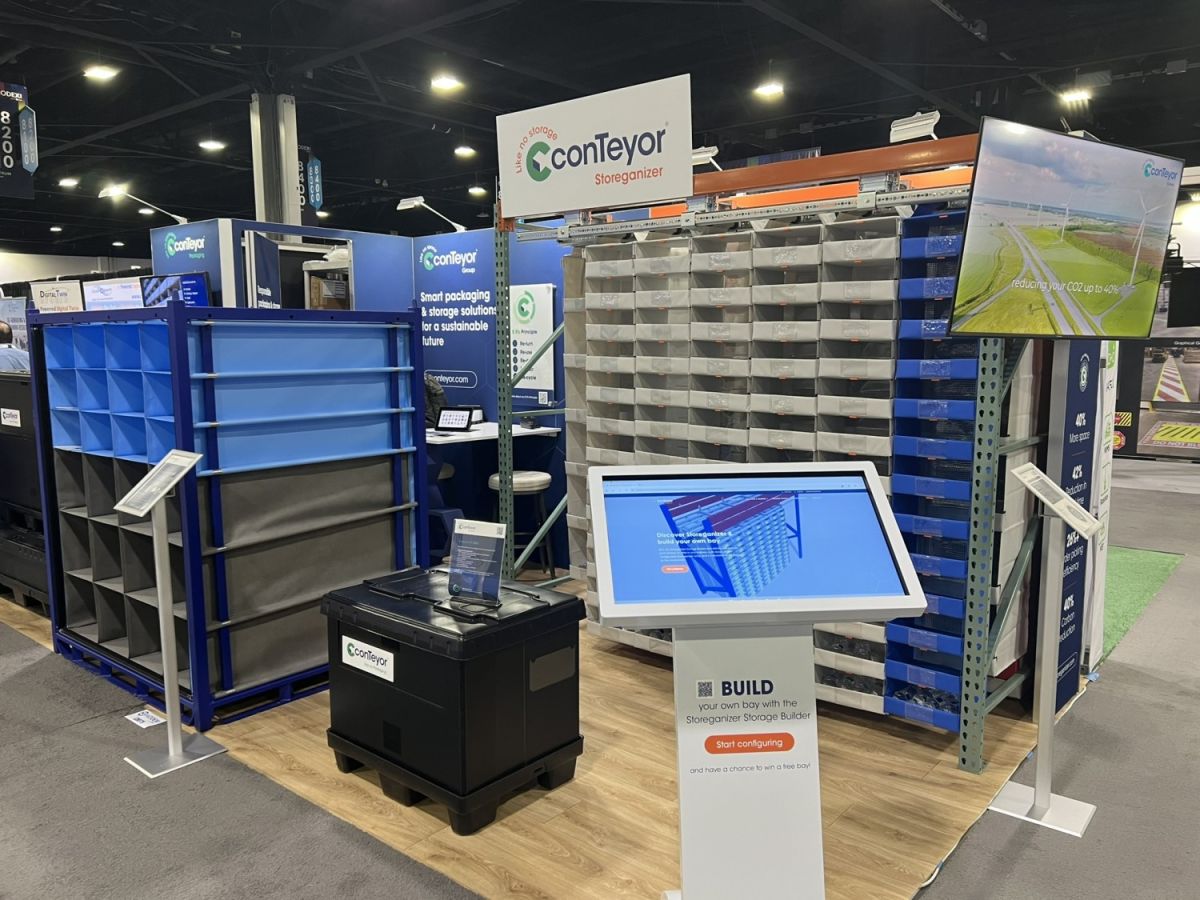A showcase of ConTeyor's storage solutions at a trade show, featuring modular storage units, an interactive touch screen for configuring storage options, and a display monitor promoting sustainability efforts.