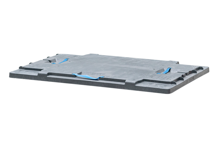 A gray pallet with blue straps, used for transporting goods.