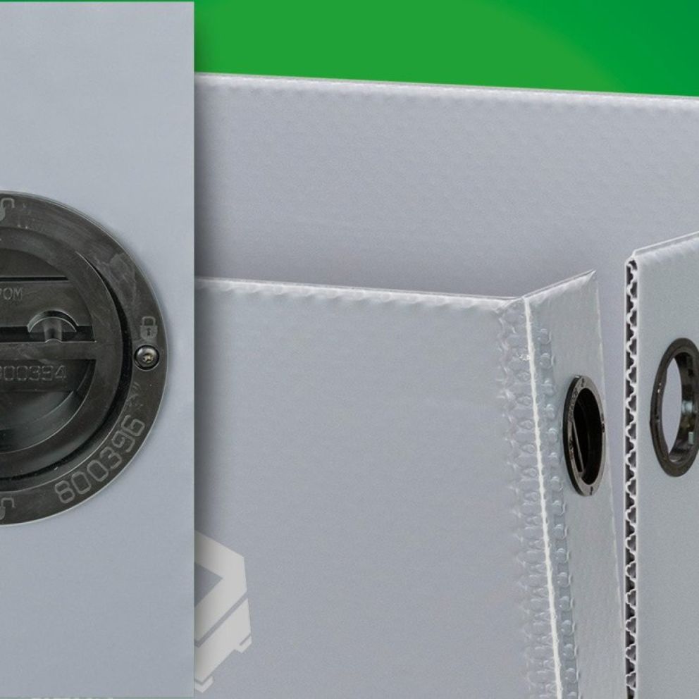 Detailed view of a white binder with a black circular mechanism on the left, showcasing a textured surface and a partially opened edge.