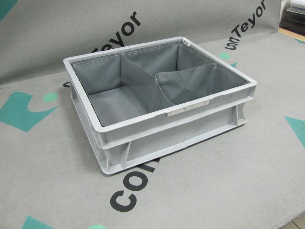 A fitbox with custom textile dunnage inserts