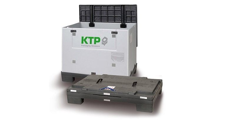 A white packaging container labeled "KTP Packaging Solutions" stands next to a black pallet with a textured surface.