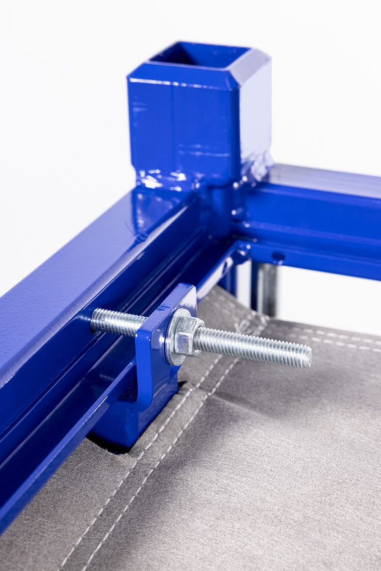 A close-up of a blue modular rack with textile inserts