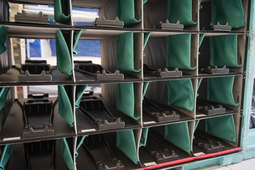 A transport rack with textile inserts