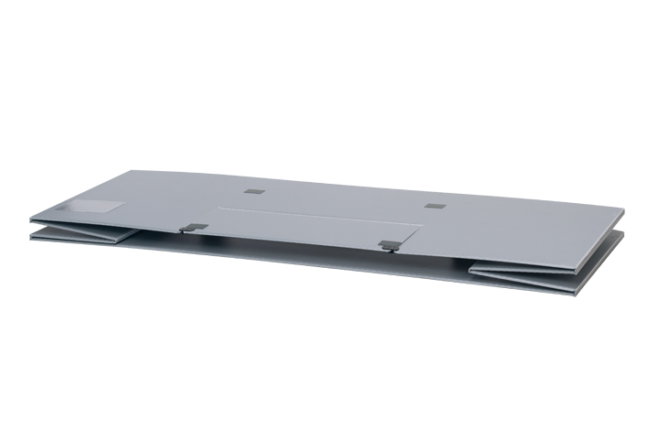 A flat, rectangular metal panel with two side flaps and four square openings.