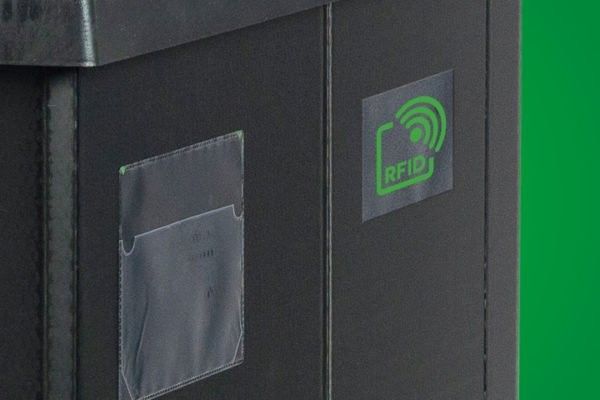 A black storage box featuring an RFID logo and a clear plastic pocket.