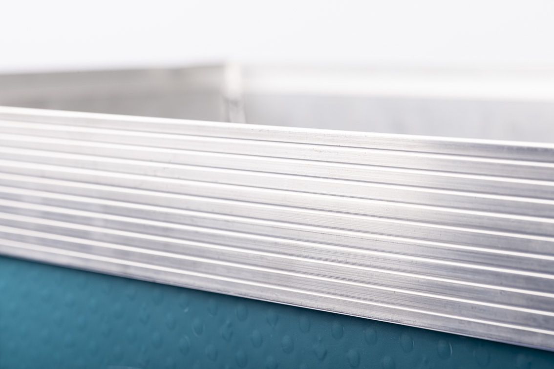 A detail shot of a blue conTeyor Ecobox with black details