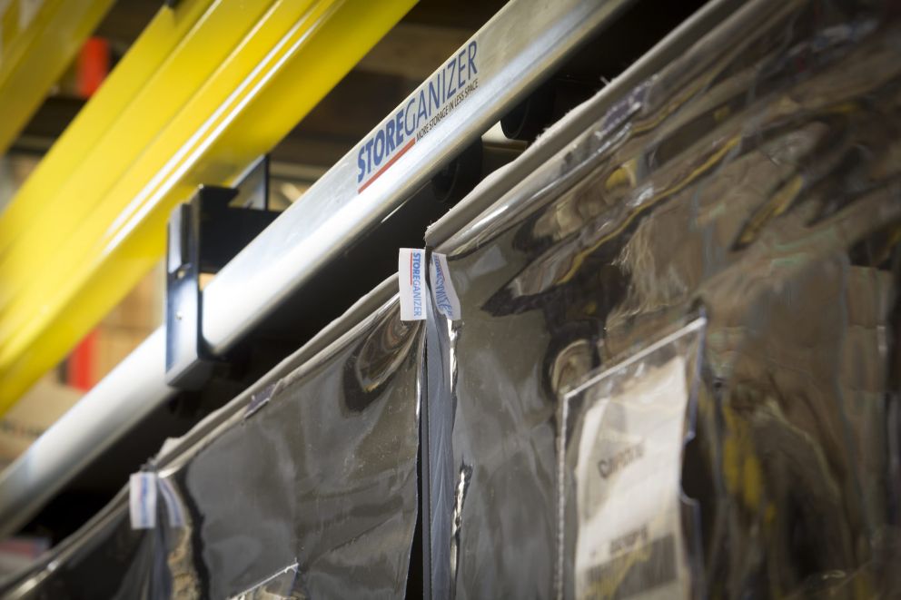 A Storeganizer's installation for H.Essers in a large warehouse with yelllow accents