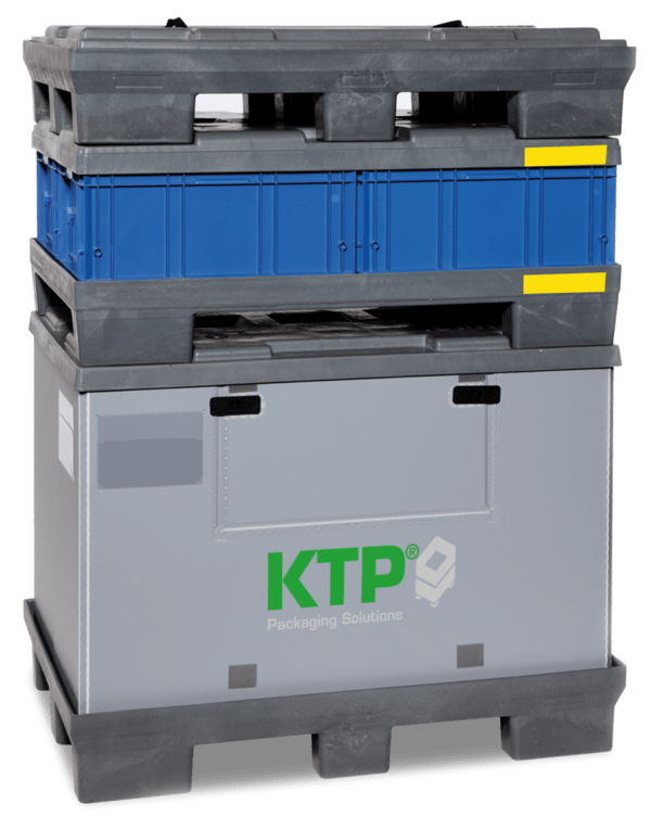 Stacked plastic containers in various colors, featuring a gray container with a green "KTP Packaging Solutions" logo at the front and a blue container with yellow markings above it.
