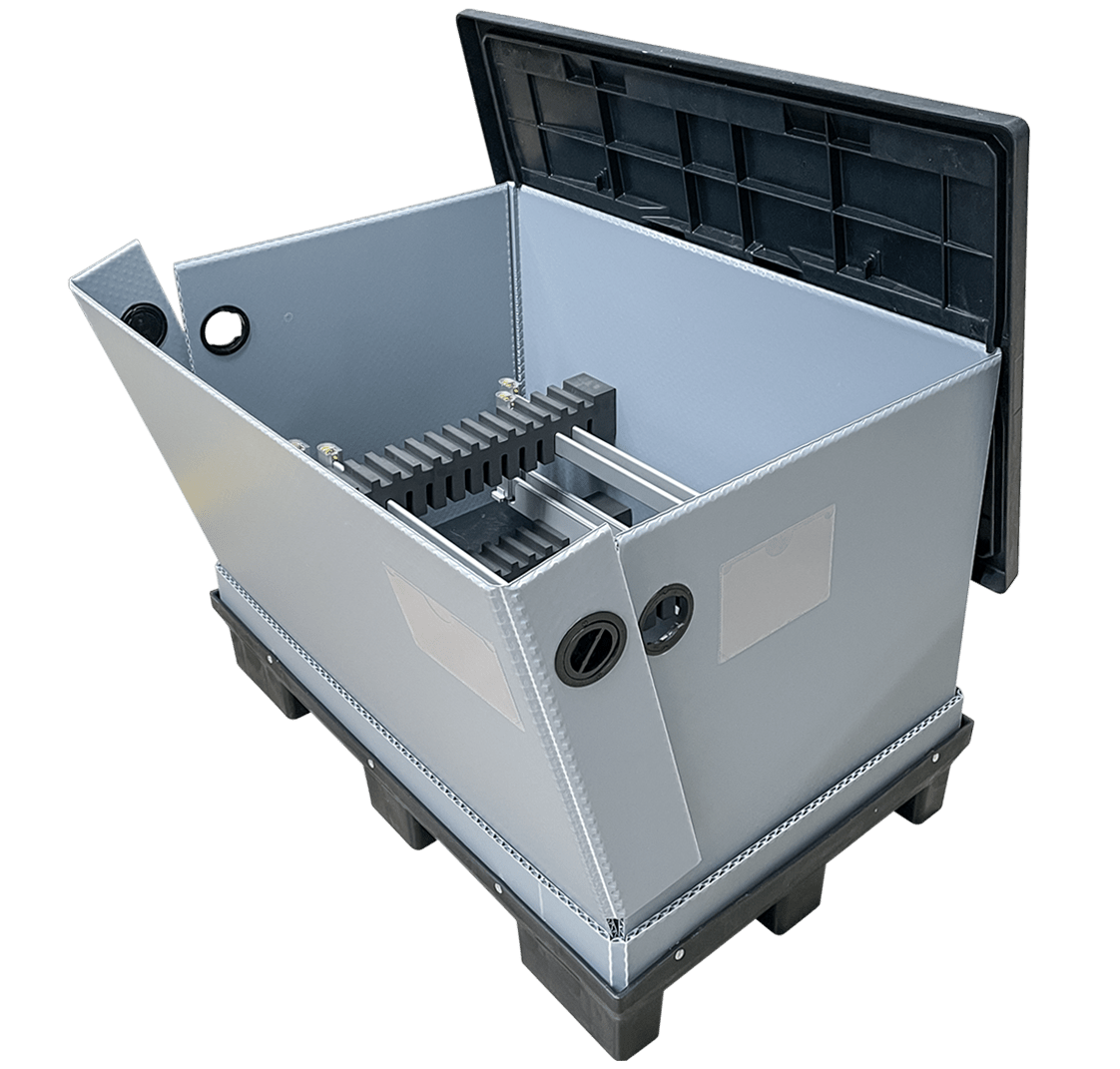 A partially open, large gray storage container with a black plastic lid, featuring ventilation holes and internal dividers for organizing items, sitting on a black pallet base.